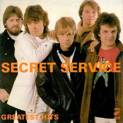 Secret Service - Greatest Hits (Kompilacja, Winyl, LP, ℗ 1982 © 1986): oprawa graficzna przedniej okładki