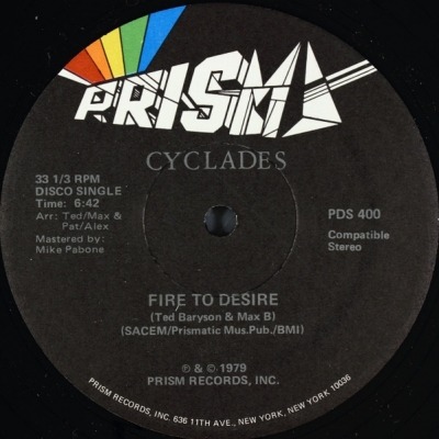 Fire To Desire / Ah! Ah! ... Encore - Cyclades (Winyl, 12", 33 ⅓ RPM, Singiel, ℗ © 1979 Stany Zjednoczone, Prism #PDS-400) - przód główny
